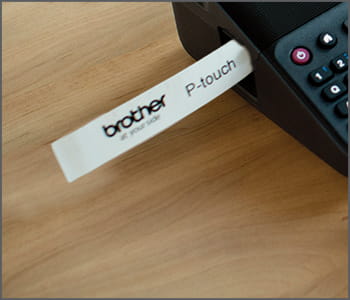 PT-D600VP Ptouch label maker printing a label. 