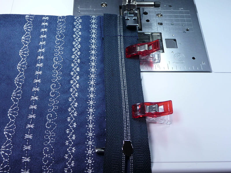Stitching the fold by using a sewing machine