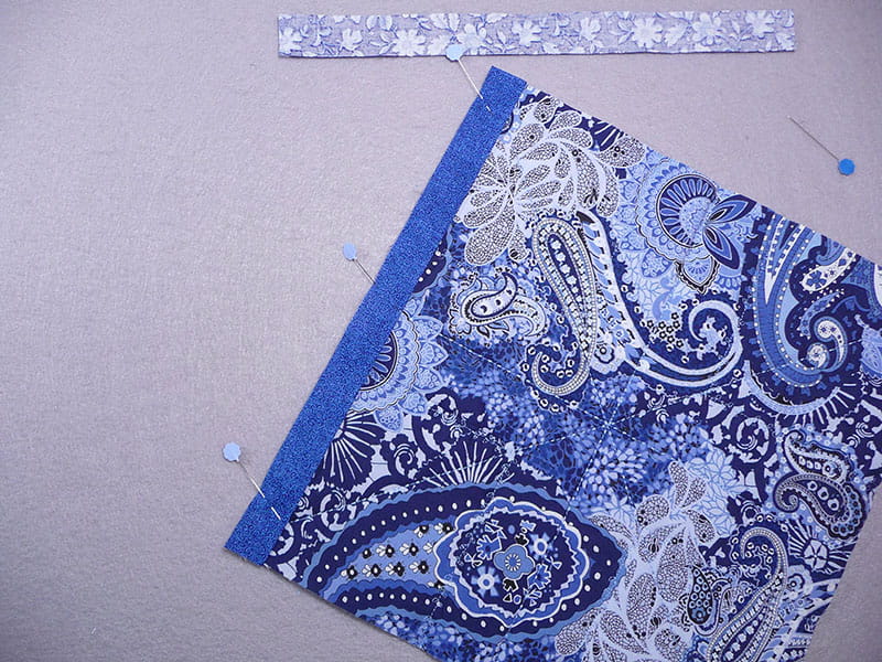 Top view of the fabrics with pins displaying where the pins go to connect them