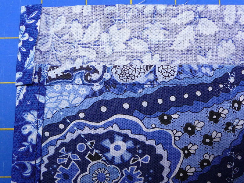 fabric sewn and folded displaying how the edges need to fold