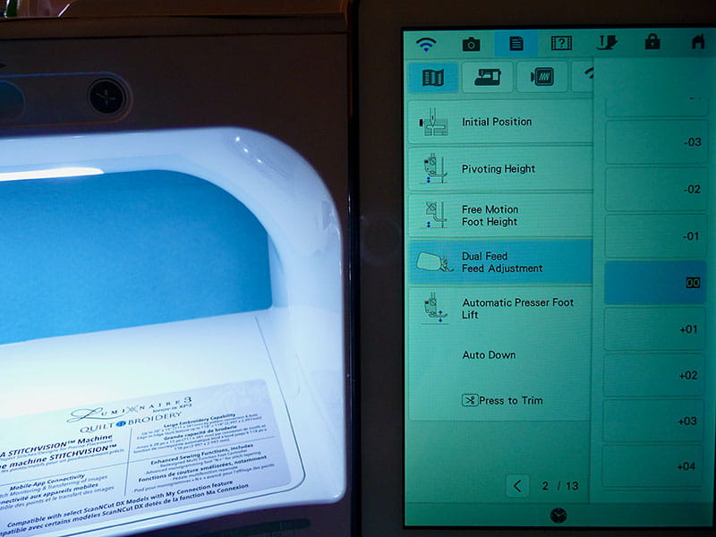screen of sewing machine displaying highlighted dual feed feed adjustment with its options