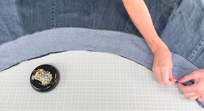 Inserting pins to hold the fabrics together