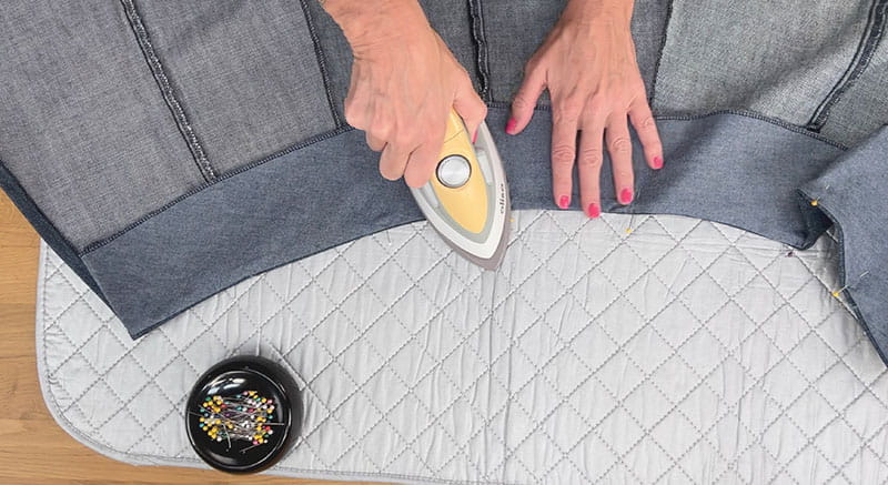 Ironing the waistband for the final touches