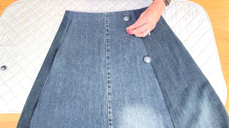 Placing the button on the front of the skirt