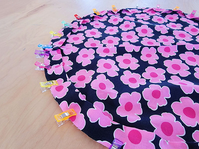 Using clips to hold down the fabric together