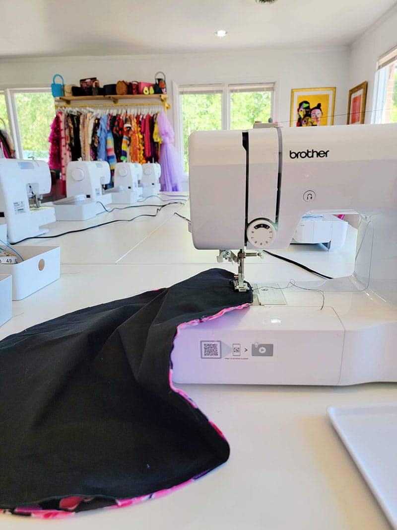 Continuing to sew the fabric with the sewing machine