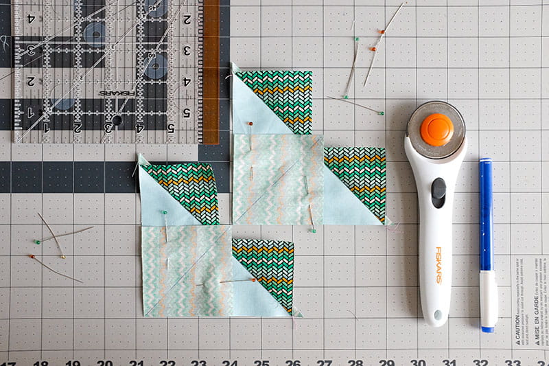 Quilt with sewing tools on right