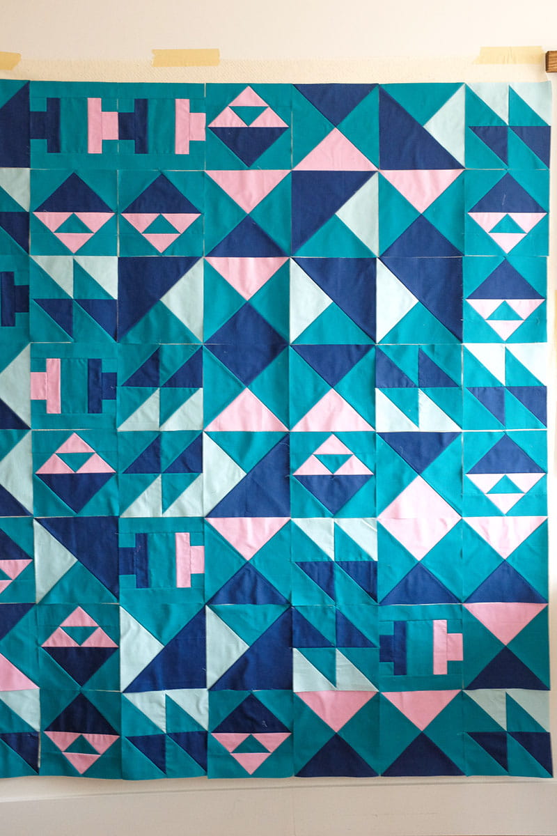 Quilt pattern on beige background