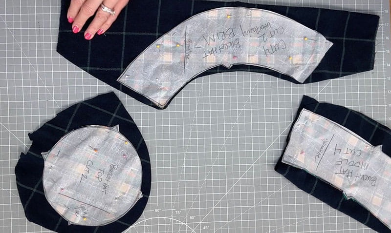 pattern pieces on the flannel displaying the areas that need to be cut
