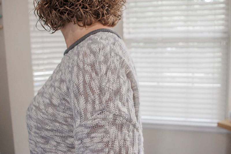 Person wearing the sweater knit