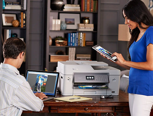 Man and Woman Working in Home Office