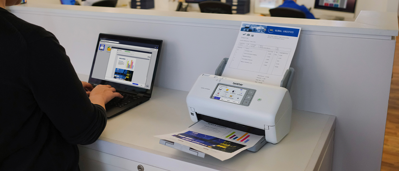 ADS4900W scanner on table in office setting