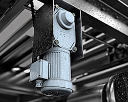 Close up of conveyor part that utilizes Brother gearmotors