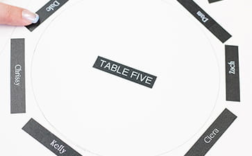 Wedding seating chart made with P-touch Embellish white on black label tape 