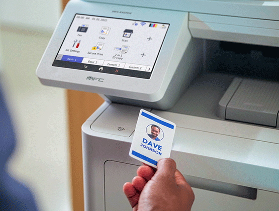 Dave Johnson scanning badge on Brother MFC-EX670W all-in-one to use securely. 