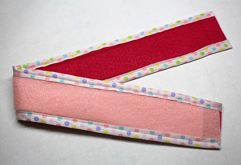 Easter Basket 36-Stitch along the edge of the ribbon.