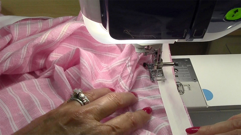 Strapless Top-55-Turn the bias tape toward the inside of the garment, press and stitch