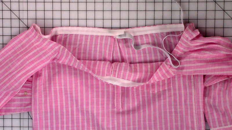 strapless top -71-Insert the elastic into the back opening of the bias tape