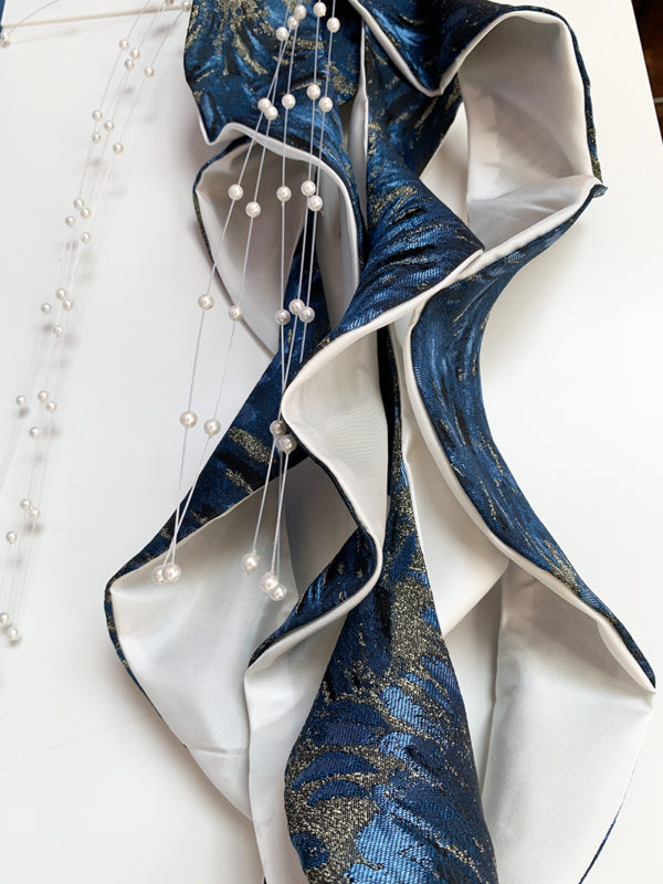 Cascading Ruffles and Embellishment