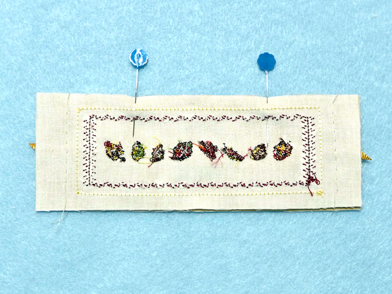 Pin backing to fabric