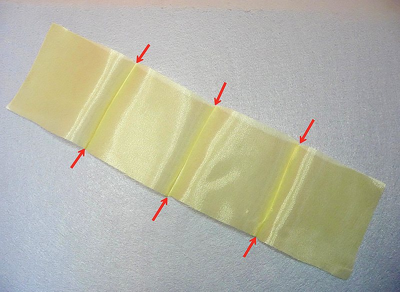 arrows pointing to fabric