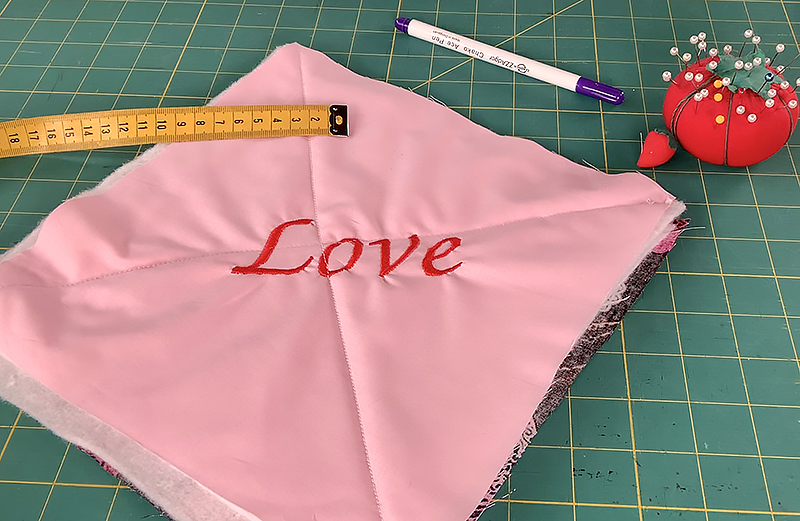 Sewn fabric in X pattern