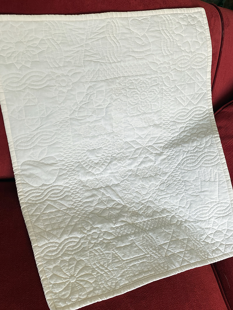 white fabric with textured stitch
