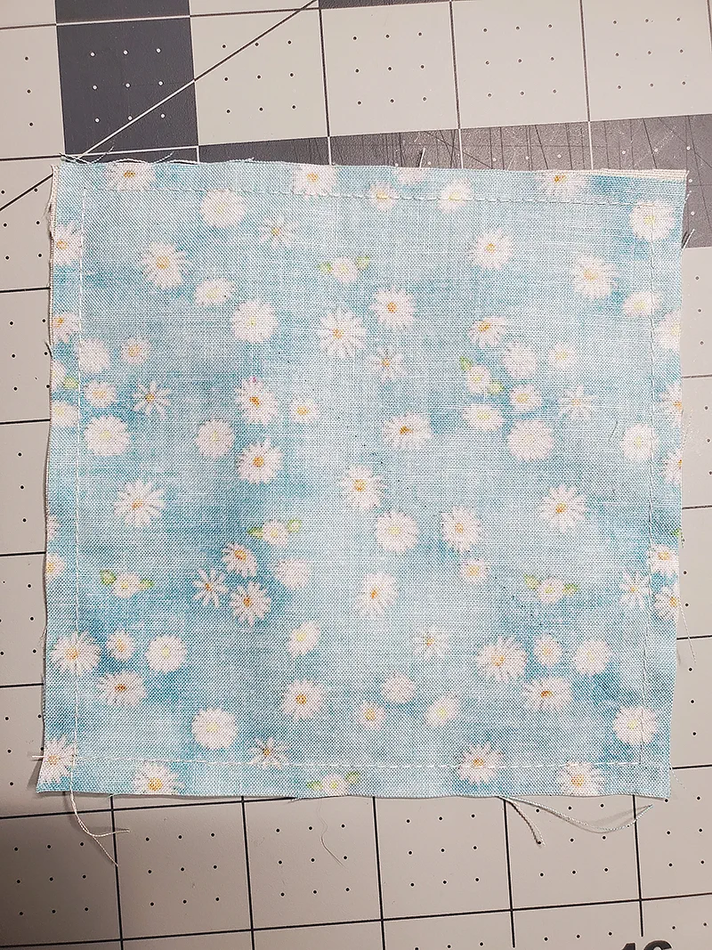 stitch perimeter of fabric squares