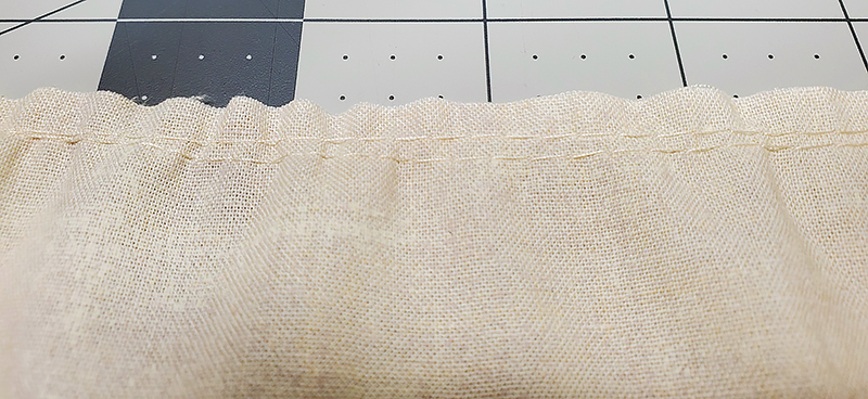 baste stitch two rows at skirt