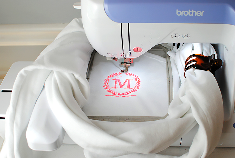 embroidering white sweatshirt