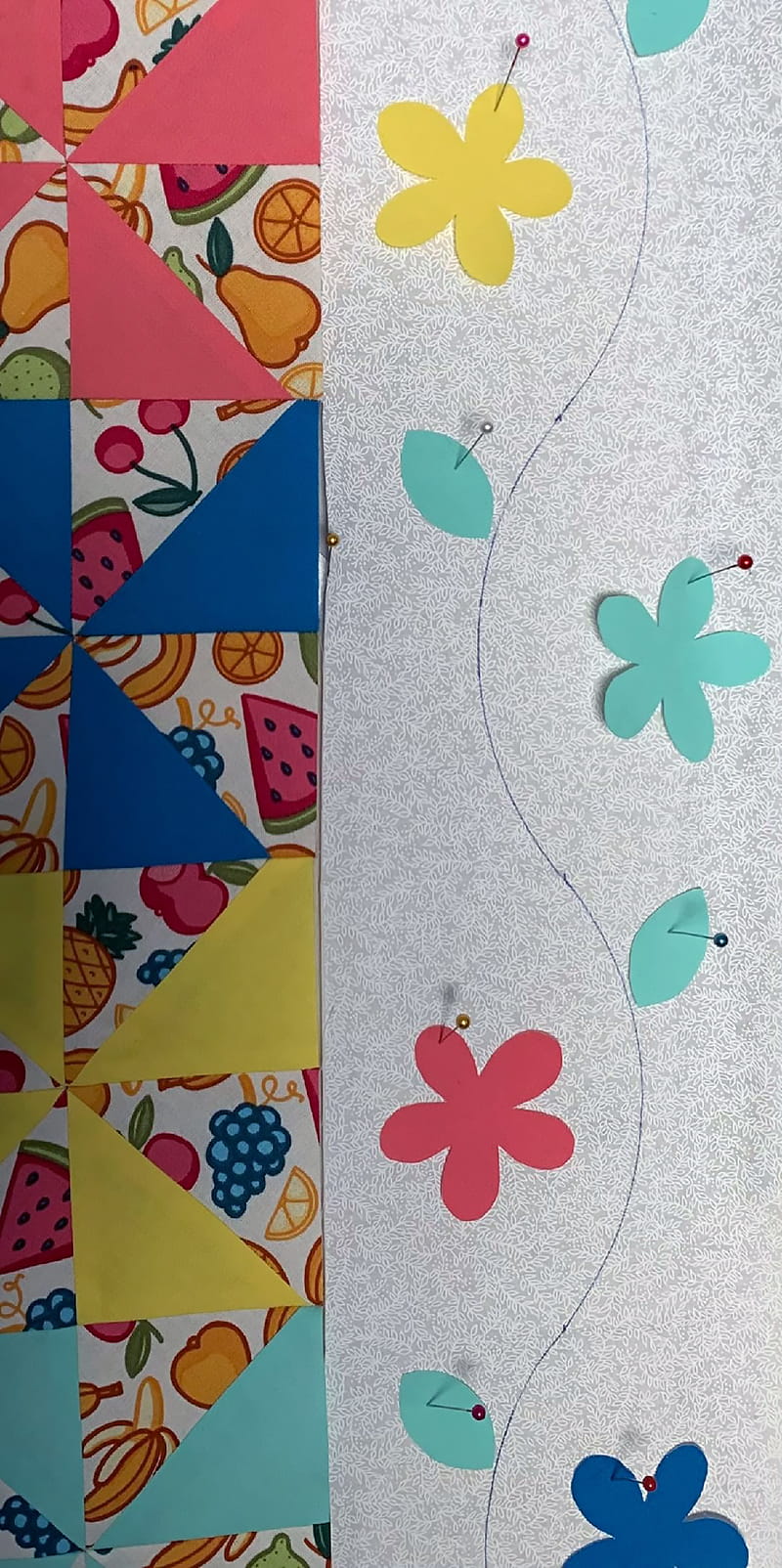 pin flowers on white fabric